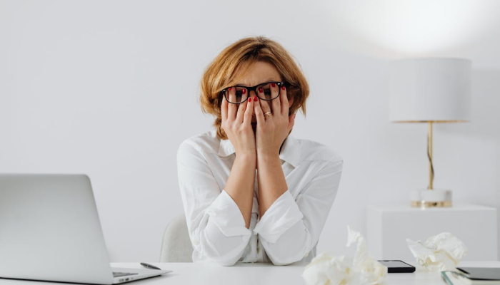 Women stressing as she cannot find a skilled finance professional